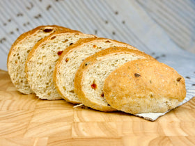 Sliced Molibake focaccia showing a tender crumb and aroma.