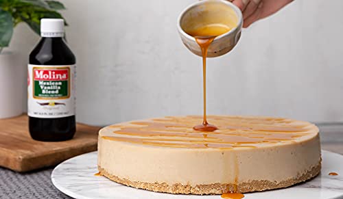 Baking scene with Molina Vanilla Original bottle beside batter and spoons.