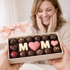 Cake pops coated with Moliss dark chocolate for polished results.