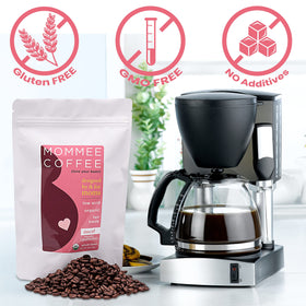 Mommee Coffee grinder and beans illustrate versatile grind for any brew.