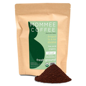 Mommee Coffee Quarter Caf pack shot emphasizing low acidity for smoother cups.