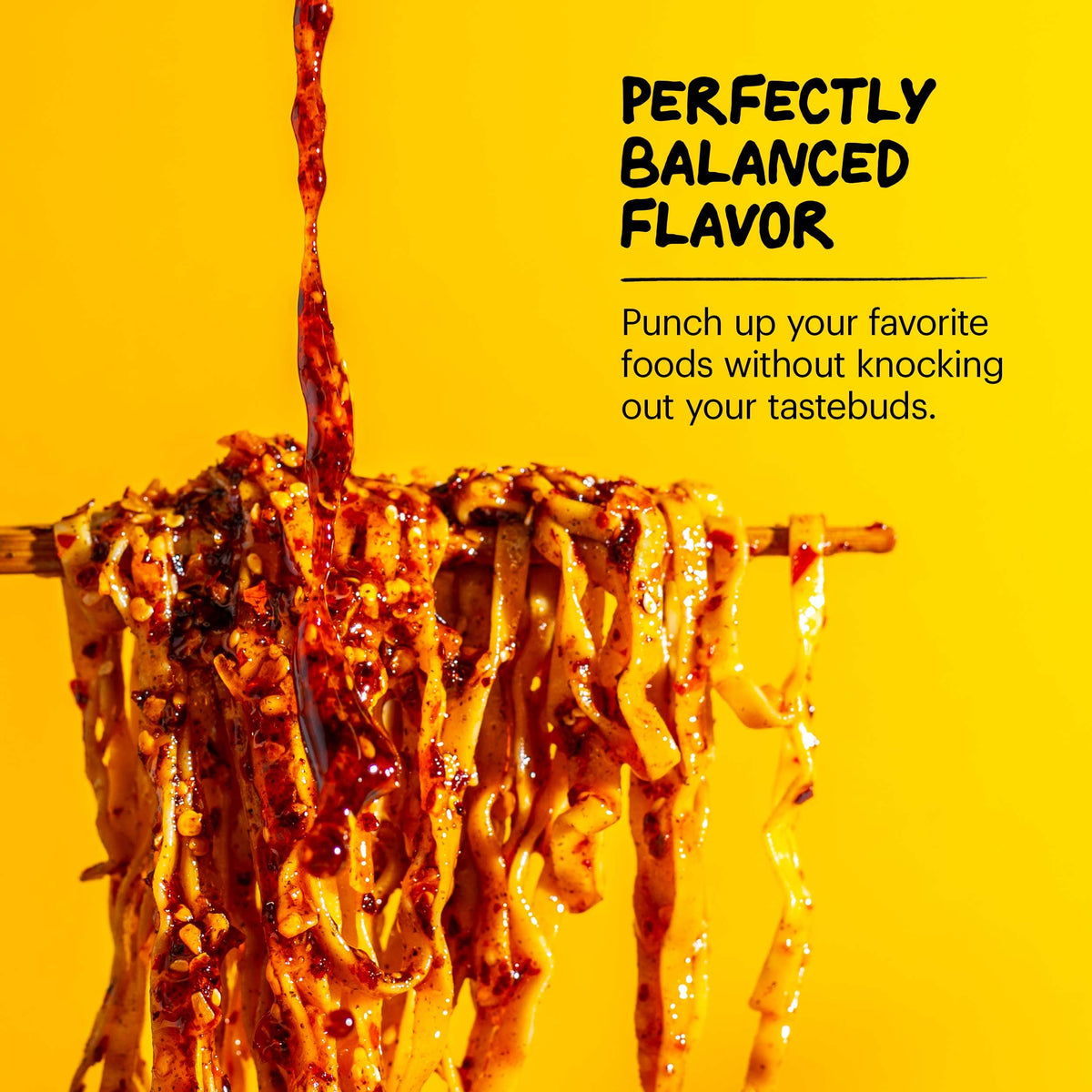 Momofuku Chili Crunch finished dish with glossy chili oil drizzle.