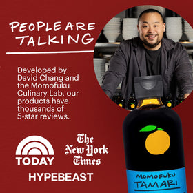 Momofuku Tamari being poured into a glass to reveal deep umami