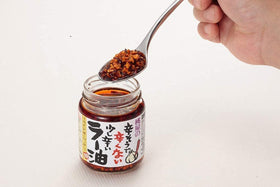 Momoya Chili Oil label close-up highlights fried garlic.