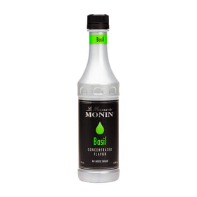 Monin Basil flavor concentrate bottle showcases natural basil flavor for drinks and dressings.
