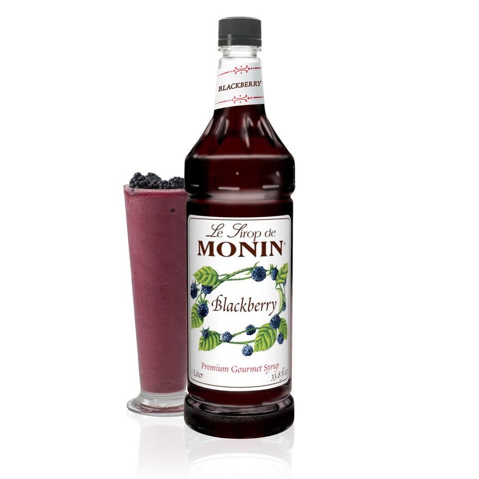Monin Blackberry Syrup bottle showcases rich color for drinks and desserts.
