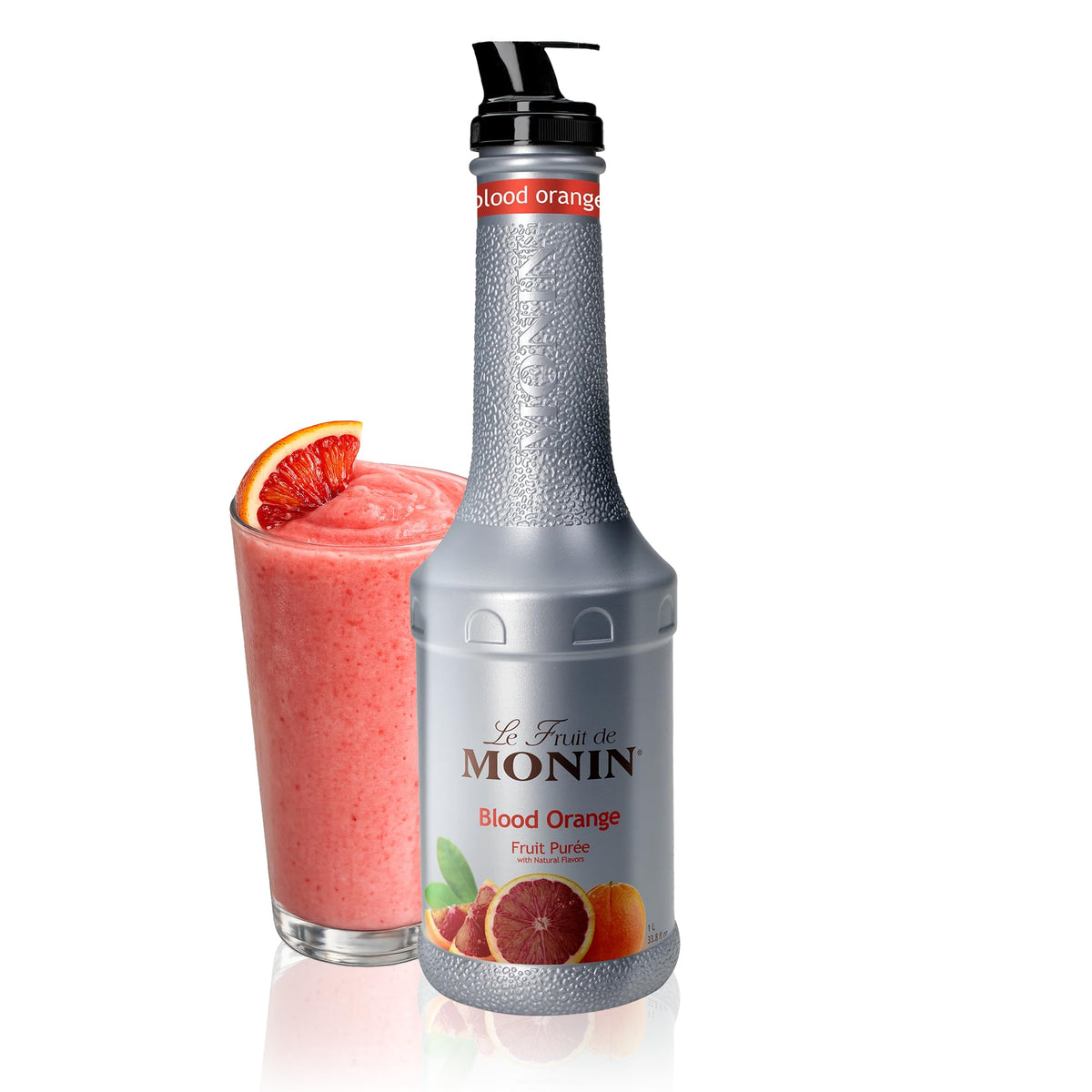 Monin Blood Orange Purée bottle closeup, vivid hue ideal for bright lemonades and cocktails.