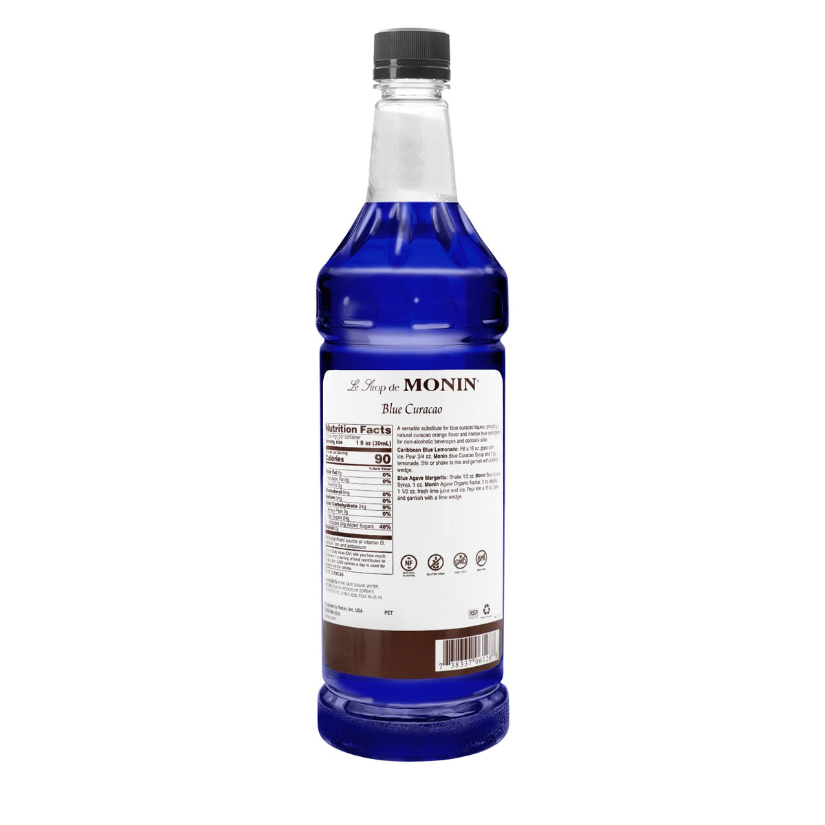 Monin Blue Curacao Syrup pouring into a glass, ideal for tropical cocktails and lemonade accents.