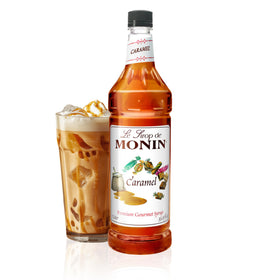 Monin Caramel Syrup bottle pour enhances beverages with rich caramel flavor.