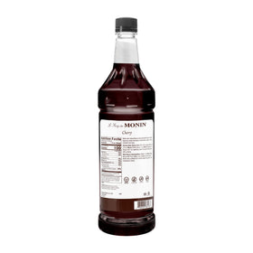Monin Cherry Syrup being poured over ice for refreshing drinks.