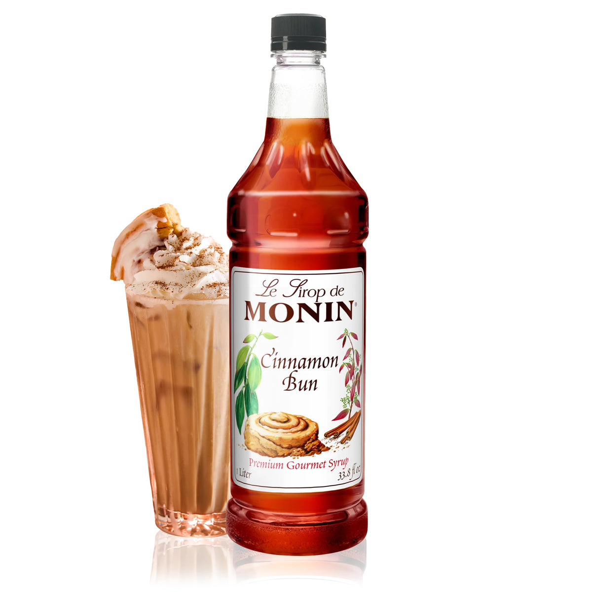 Monin Cinnamon Bun Syrup bottle on a bar, ready to flavor cocktails