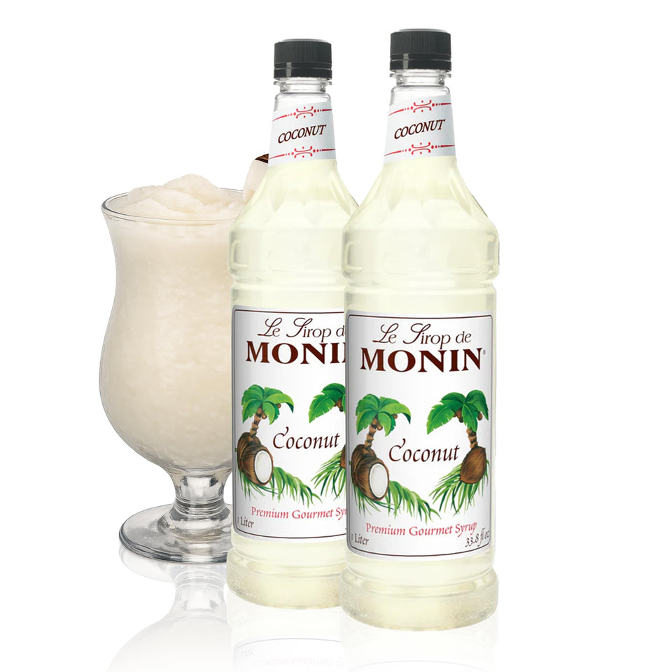 Monin Coconut Syrup bottle pour for tropical drinks and cocktails