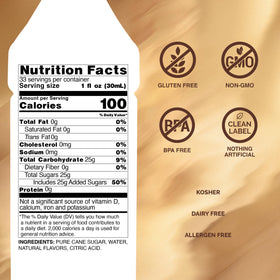 Close-up of Monin Coconut Syrup bottle highlights vegan and non-GMO formula for tropical flavor.
