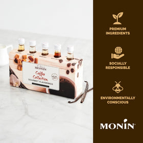 Monin Irish Cream coffee syrup bottle pour delivers rich, dessert-like coffee experiences.