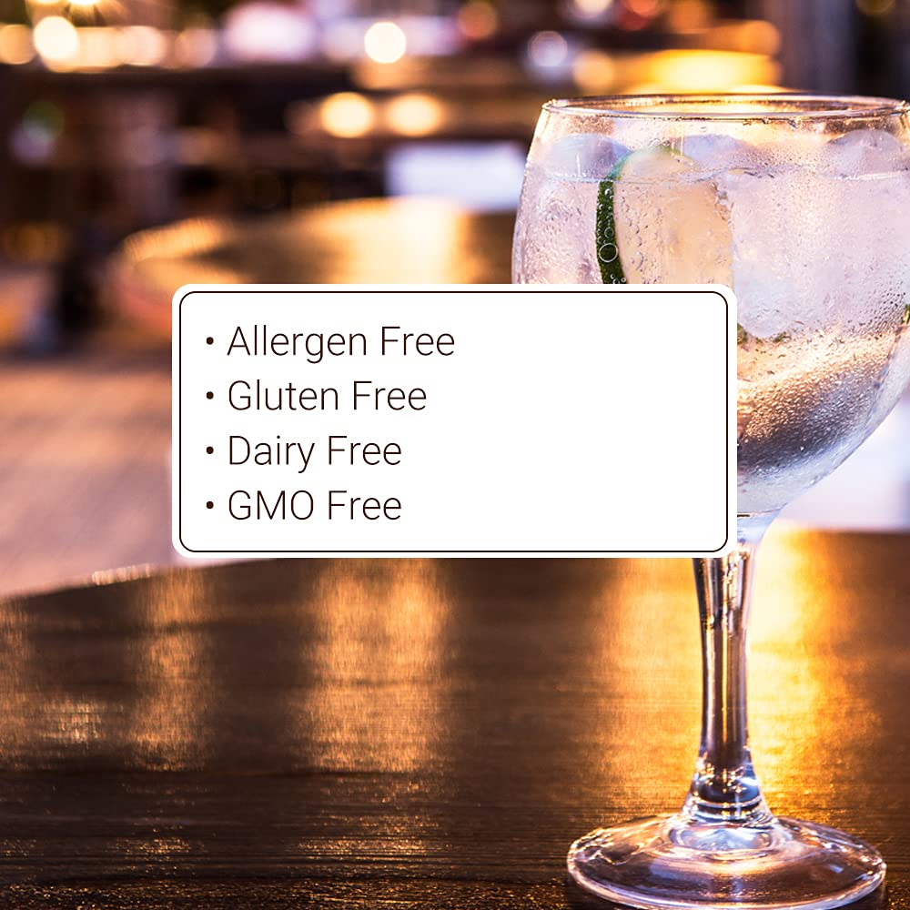 Monin Desert Pear Syrup served over ice with citrus twist