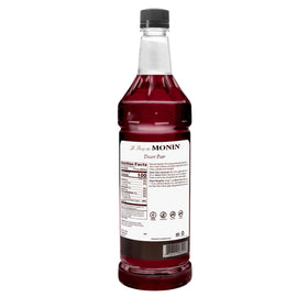 Monin Desert Pear Syrup pour over glass to flavor cocktails and mocktails