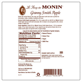 Monin Granny Smith Apple Syrup bottle with green packaging reinforces sustainability.