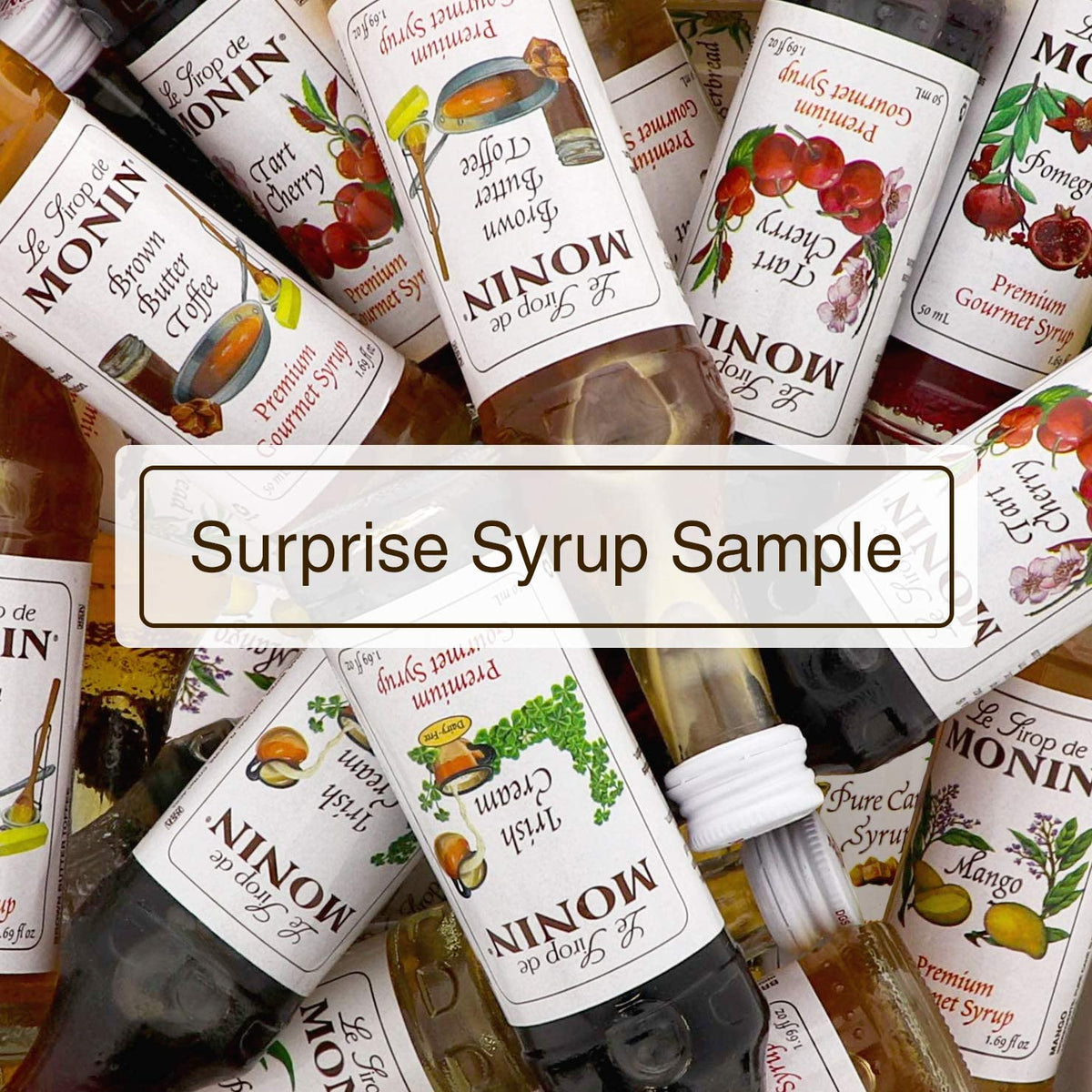 Monin Granny Smith Apple Syrup bottle over lemonades for bright flavor