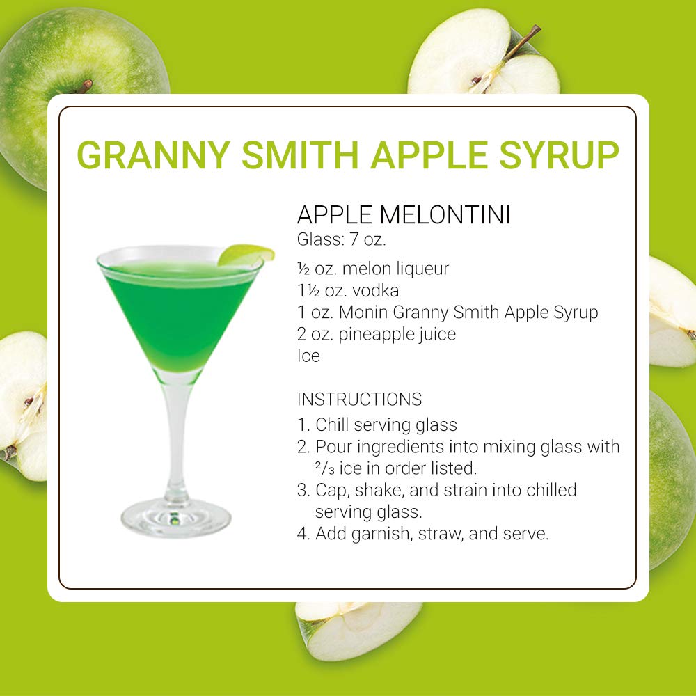 Monin Granny Smith Apple Syrup next to a tea cup enhances iced tea flavor.