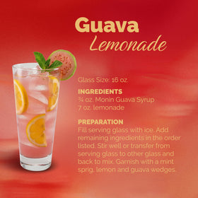 Glass of tropical drink colored with Monin Guava Syrup for bright flavor