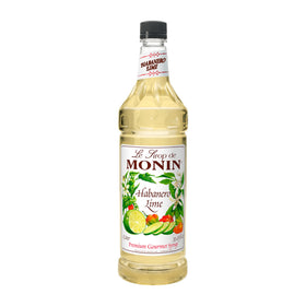 Monin Habanero Lime Syrup bottle pour, adds bold heat to cocktails.