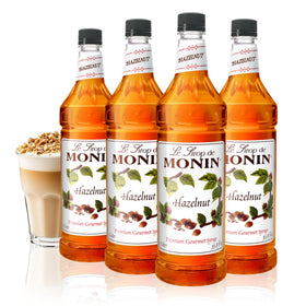 Monin Hazelnut Syrup bottle showcases caramelized hazelnut flavor for coffee