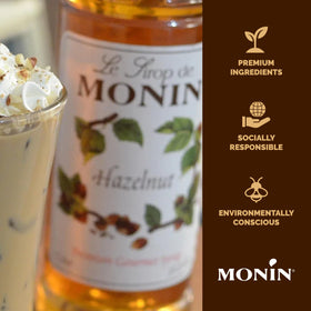 Monin Hazelnut Syrup pour on coffee creates creamy, nutty mochas