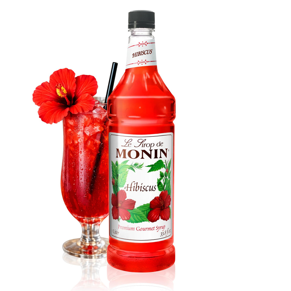 Monin Hibiscus Syrup bottle shown for tropical beverage enhancement.