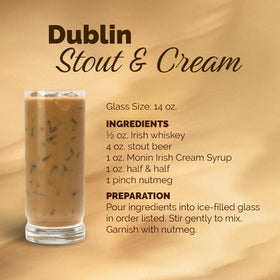 Monin Irish Cream Syrup bottle on the kitchen counter for easy use.