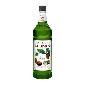 Monin Kiwi syrup bottle pours, highlighting emerald-green color and versatile use in refreshing drinks.