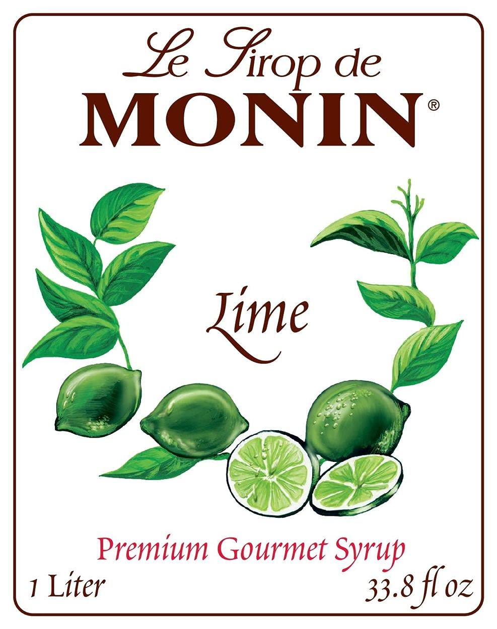 Pouring Monin Lime Syrup into a glass for zesty cocktails