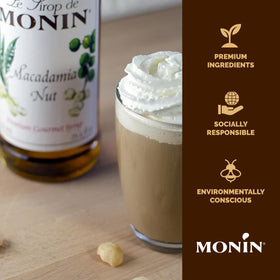 Sleek BPA-free bottle of Monin Macadamia Nut Syrup for premium beverages.