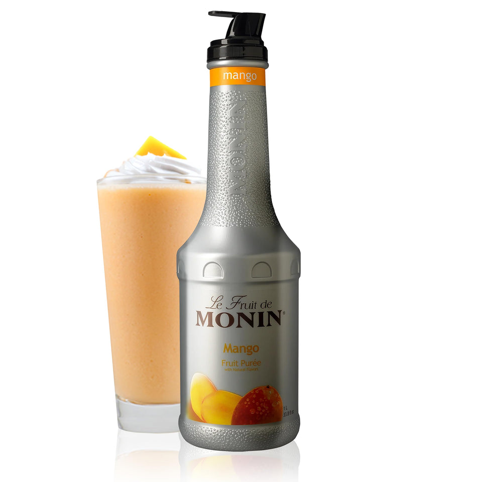 Monin Mango Purée bottle pour elevates tea with tropical aroma.