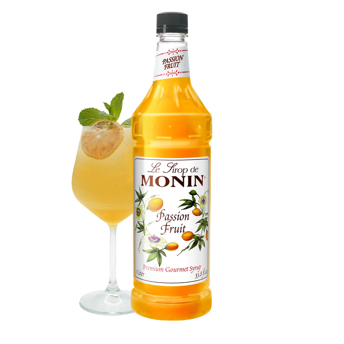 Monin Passion Fruit Syrup bottle on a bar shelf, ideal for teas and cocktails.