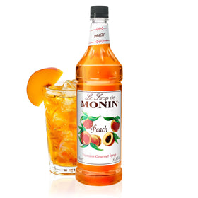 Monin Peach Syrup bottle front view for year-round peach flavor in drinks