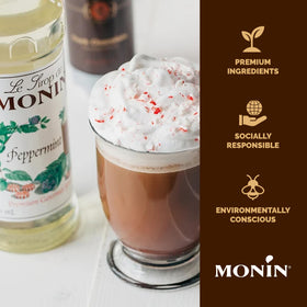 Monin Peppermint Syrup on a kitchen counter, ready for holiday beverages.