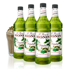 Monin Pistachio Syrup bottle pour enhances coffee with rich nutty aroma.