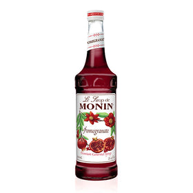 Monin Pomegranate Syrup bottle showcases vibrant, tart-sweet depth for beverages