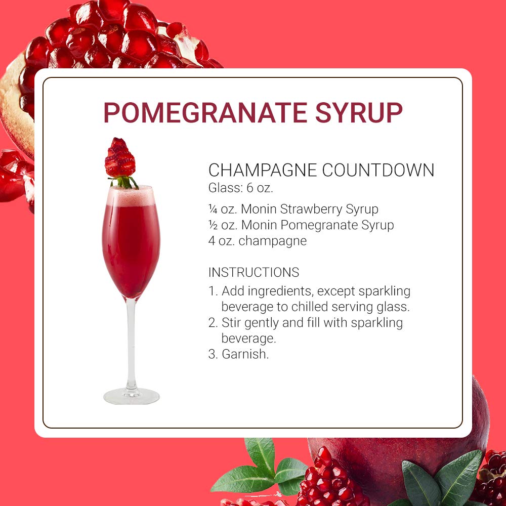 Monin Pomegranate Syrup glass with cocktail demonstrates rich crimson presentation