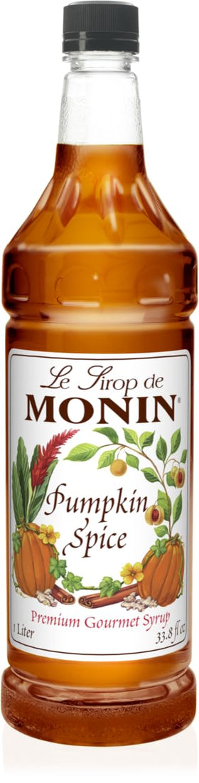 Monin Pumpkin Spice Syrup bottle, perfect for cozy coffees and autumn desserts.
