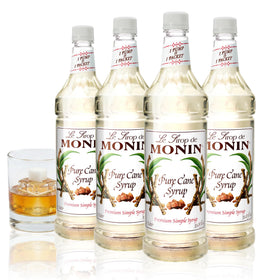Monin Pure Cane Syrup bottle pour for coffee and tea flavoring