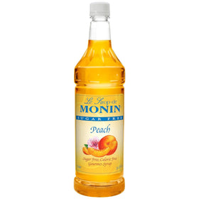 Monin Sugar-Free Peach bottle front showing the 1 liter size for versatile beverages