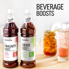 Monin Total Immunity Boost glass with pour showing convenient daily use