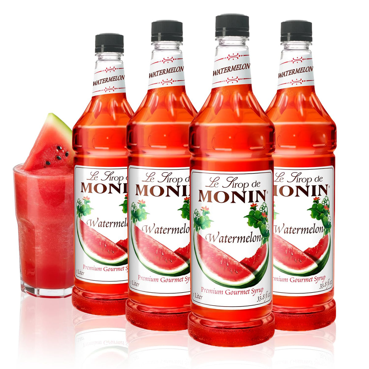 Monin Watermelon Syrup bottle being poured, ideal for refreshing sodas and lemonades.