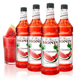 Monin Watermelon Syrup bottle being poured, ideal for refreshing sodas and lemonades.