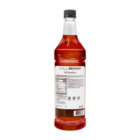 Monin Wild Strawberry Syrup poured over ice creates refreshing cocktails and mocktails