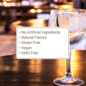 Monin Wildberry bottle on a bar setup for flavorful berry drinks.
