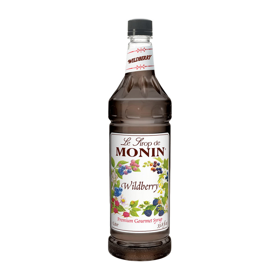 Monin Wildberry syrup bottle front showcases rich berry flavor for cocktails and desserts.