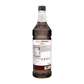 Monin Wildberry syrup pour over ice creates vibrant beverages.