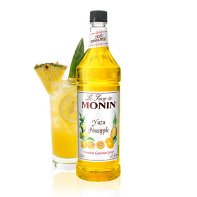Monin Yuzu Pineapple Syrup bottle ideal for tropical cocktails and mocktails.